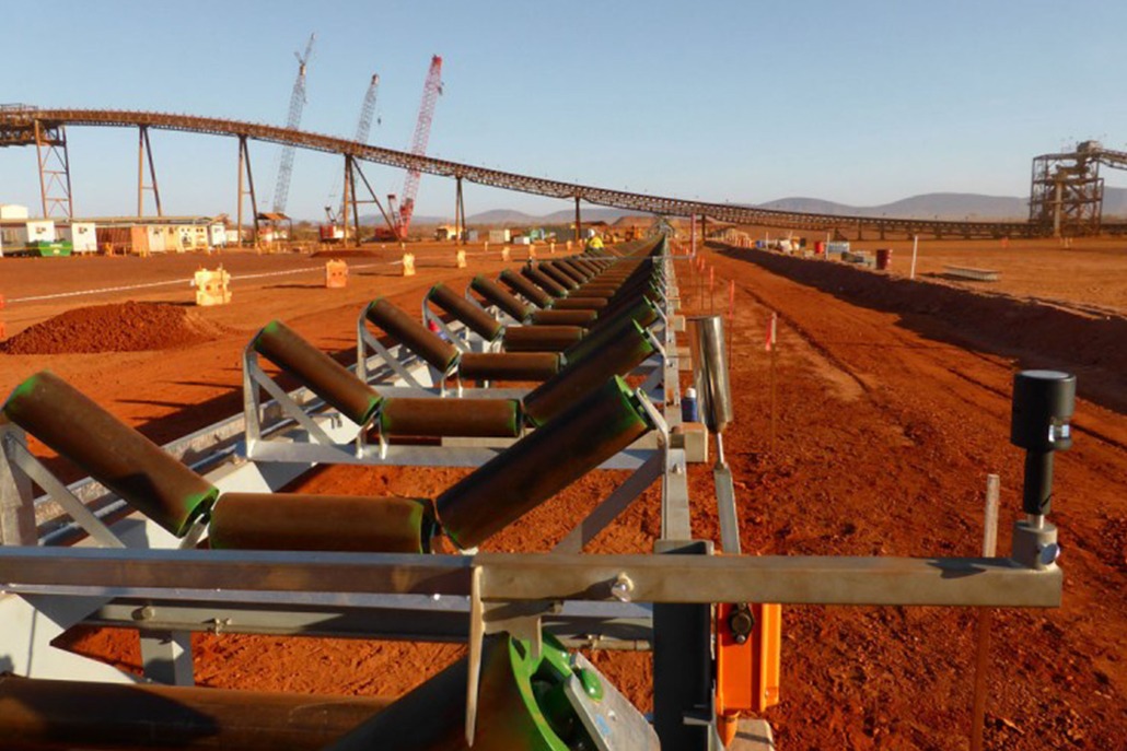 This photograph is of part of the production line at Nammuldi Mine. The large infrastructure systems that are essential to such a major project can be seen at work.