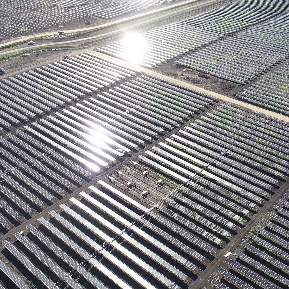 This photograph is of The Yarranlea Solar Farm from the air. The vast scale and extraordinary number of solar panels show the scale of the Mnford Group project that was successfully constructed in a state of the art manner.