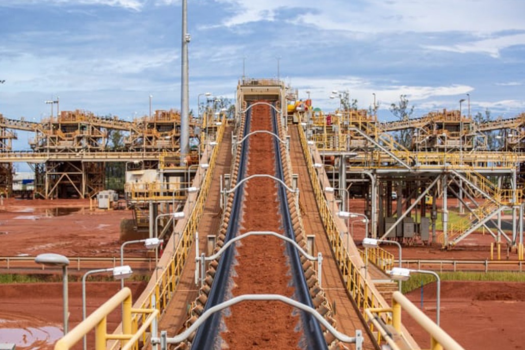 This photograph is at Amrum Mine of a conveyor belt for processing resources at the site. The huge infrastructure feature that is shown shows the prowess Monford Group has for major projects.