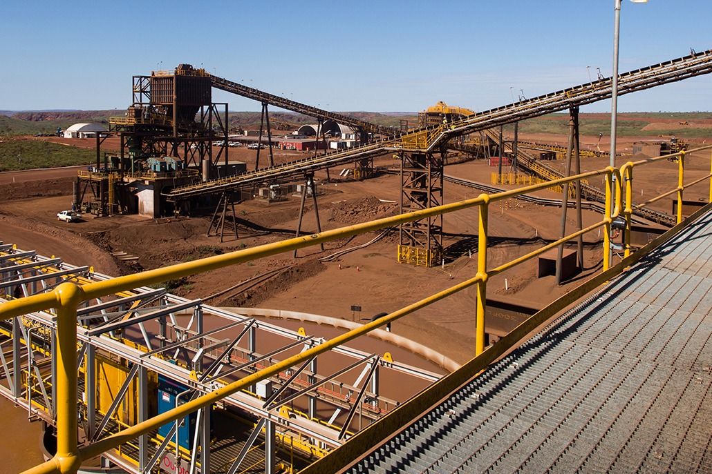 This is a photograph of a part of the process line at Solomon mine, specifically the large conveyor belts used to transfer the ore.